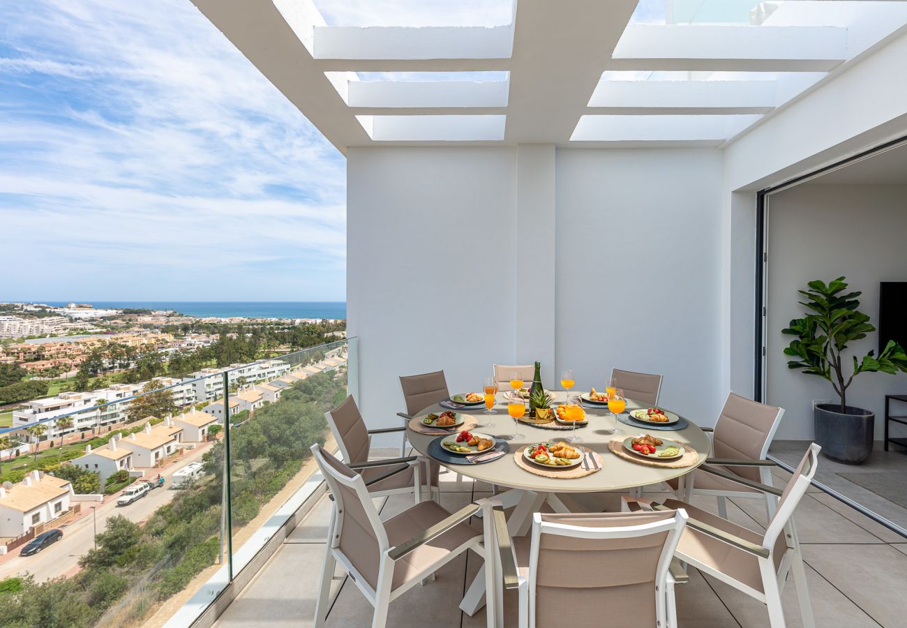 Apartamento en La Cala de Mijas - Moderno piso con vistas al golf y mar